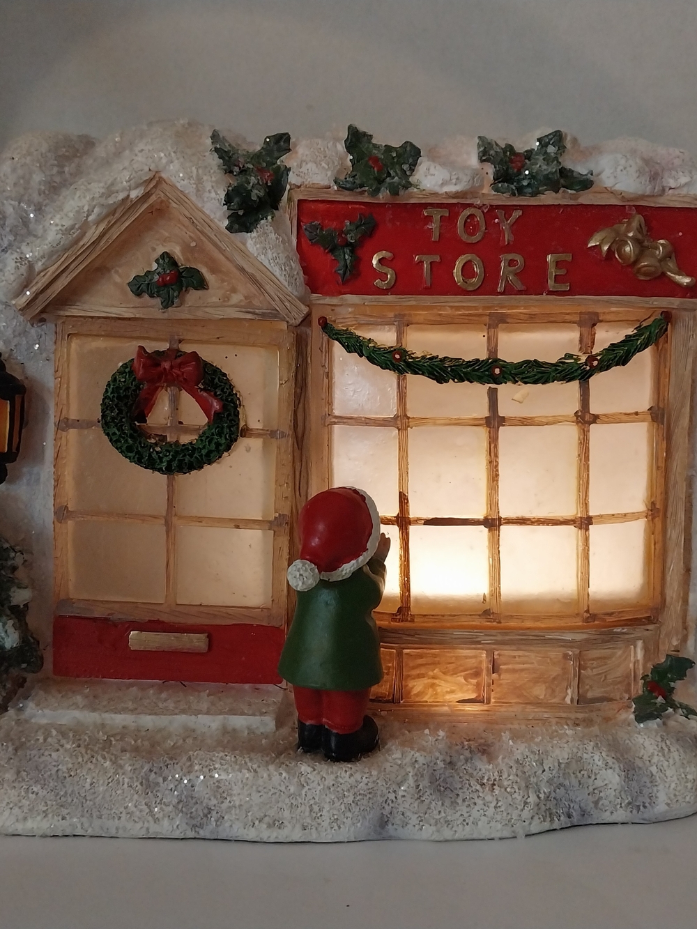National Tree Co. LED Light Up Christmas Toy Store 7 in Resin Shelf Decoration